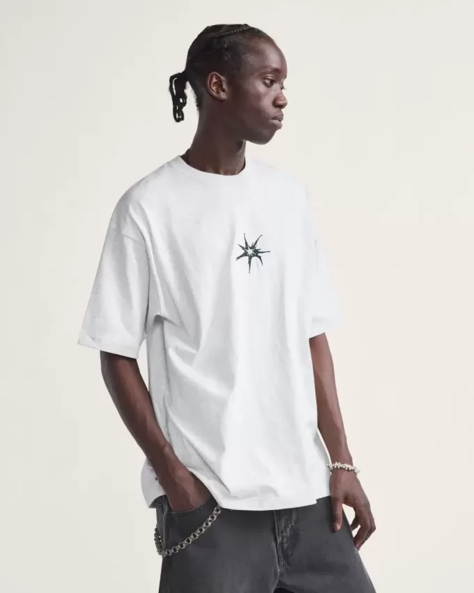 Maglietta con schizzi di skate